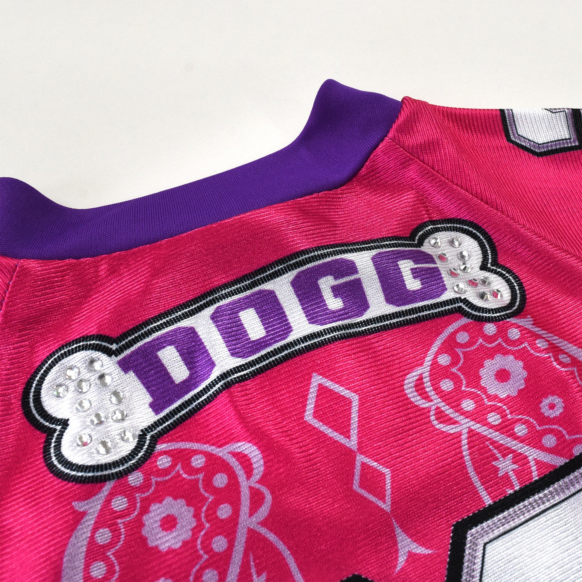 A close up detail image showing design sublimation and sparkle detail of the Boss Lady Deluxe Pet Jersey.