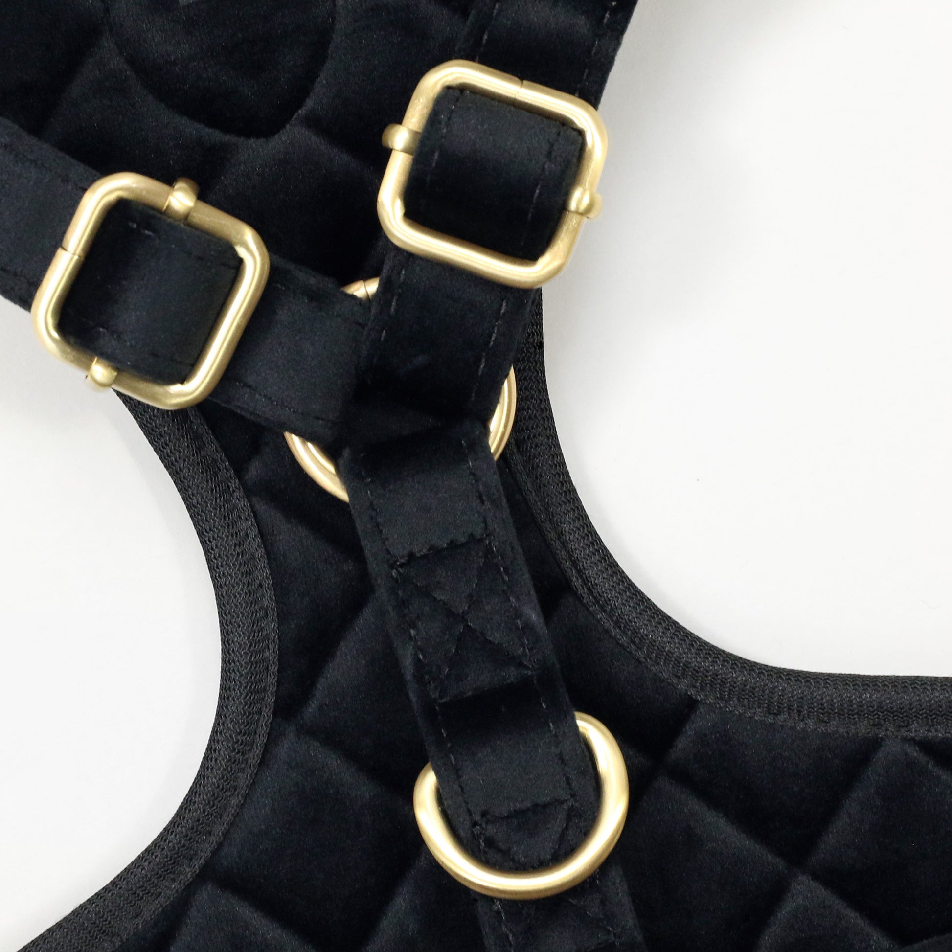 A close up detail image showing the hardware on the Deluxe Quilted Pet Harness.